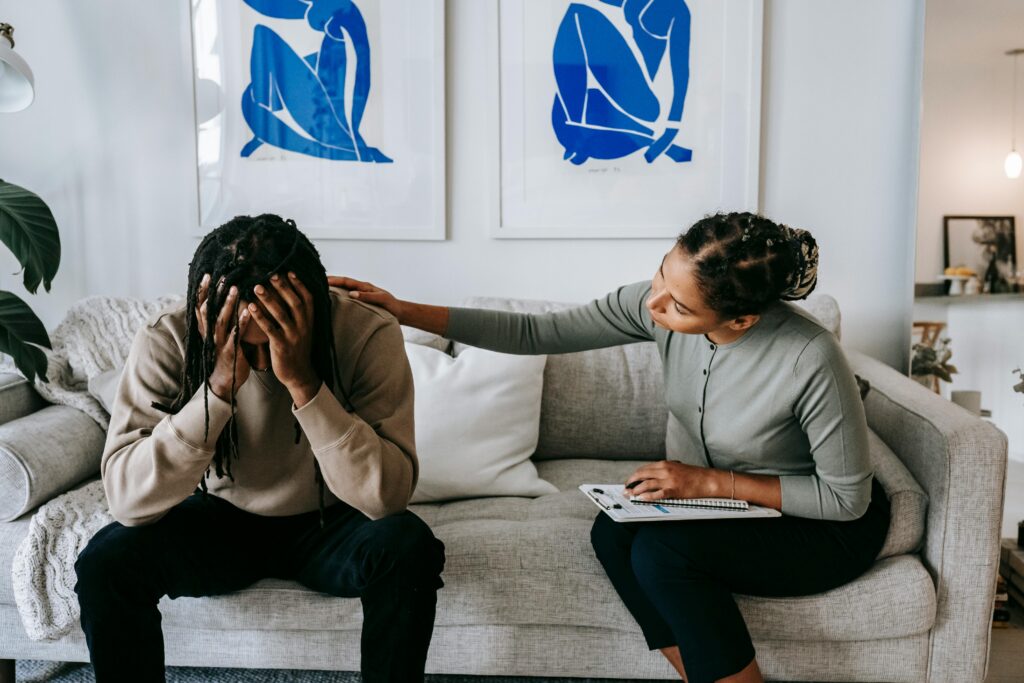 patient of color with a therapist in session