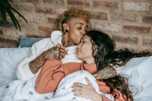 A loving same-sex couple sharing a tender moment, symbolizing trust, mutual respect, and the importance of safe, consensual intimacy.